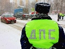 Сотрудники ГИБДД совместно с дорожными и коммунальными службами обеспечили безопасность дорожного движения в Ростовской области во время снегопада